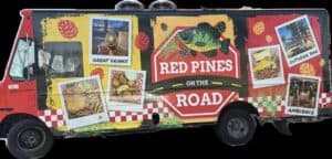 A colorful food truck labeled "Red Pines on the Road" showcases Red Pines Onalaska flair, with images of food, drinks, and a patio. Captions read: "Great Drinks," "Outdoor Bar," and "Ambience," amid pinecones and leaves decorating the design.